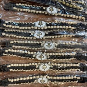 Lot of New Orleans Saints Bracelets Paracord and more